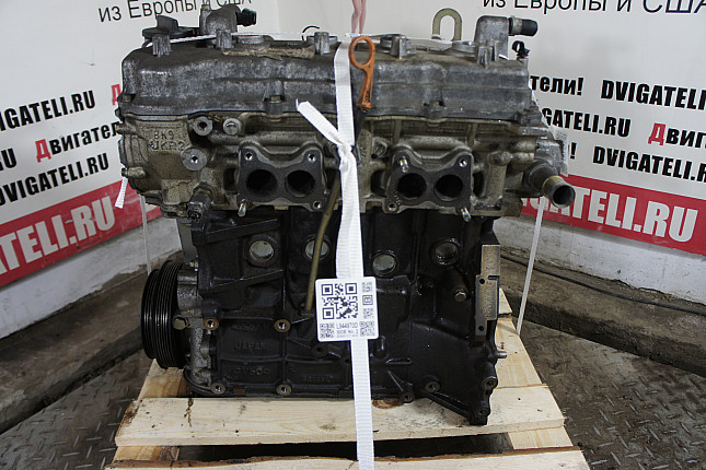 Двигатель вид с боку Nissan QG16DE