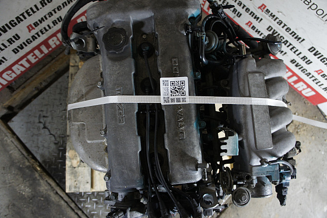 Фотография контрактного двигателя сверху Mazda B6