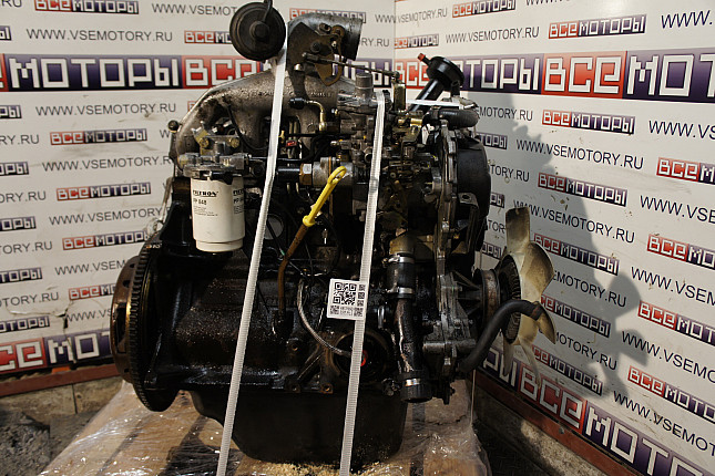 Двигатель вид с боку FORD 4CALB26941