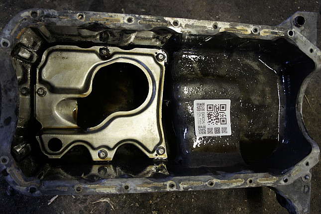 Фотография снятого маслянного поддона Mazda B6