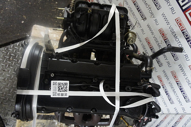 Фотография контрактного двигателя сверху CHEVROLET F14D3