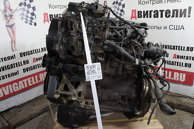Двигатель вид с боку Mitsubishi 4D68 T
