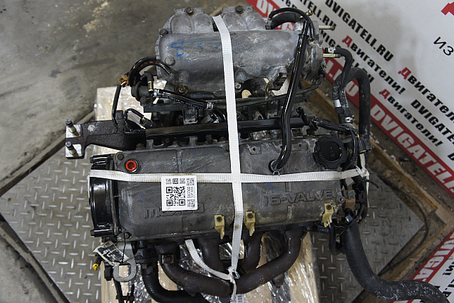 Фотография контрактного двигателя сверху Mazda B3