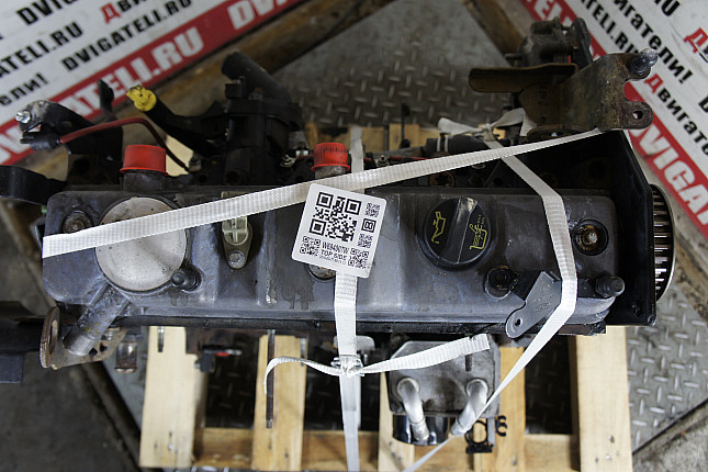 Фотография контрактного двигателя сверху Ford QYWA